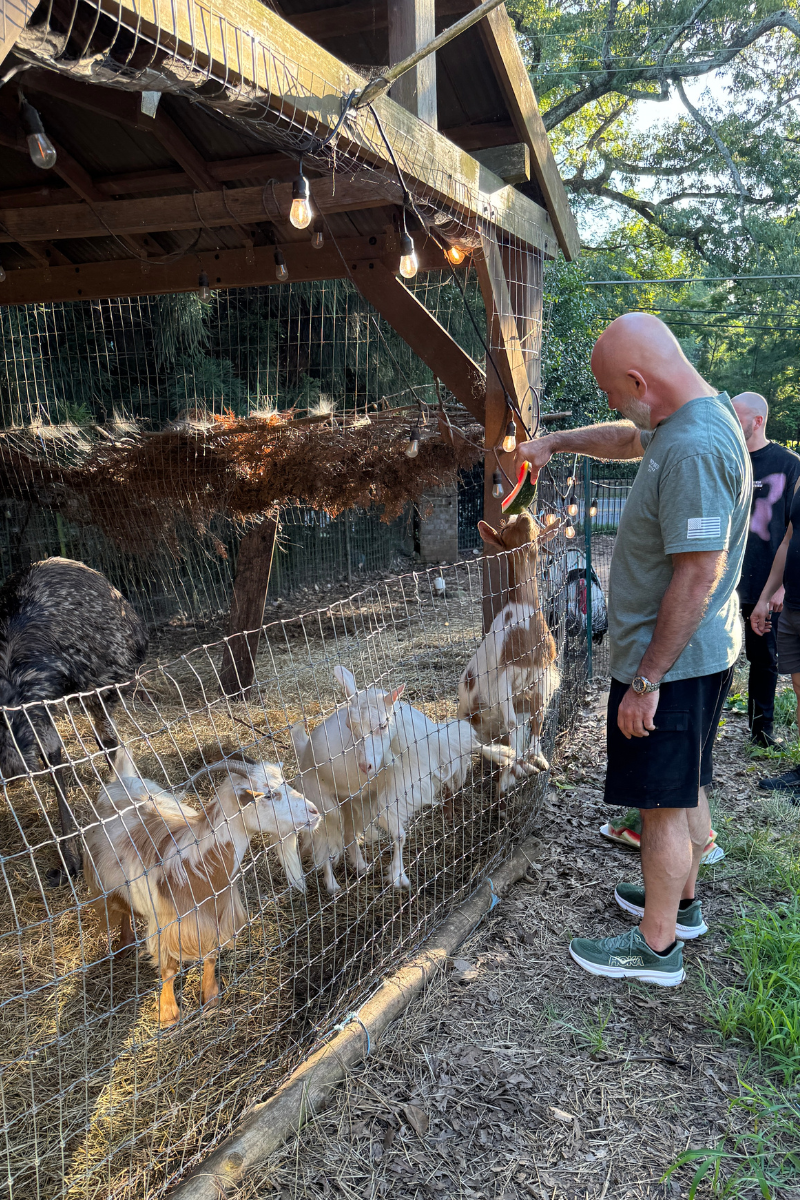 Dave Wattenberg of Pro-Tech knives Feeding Goats
